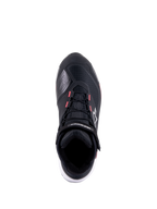 Alpinestars CR-X Drystar® motorschoen voor dames, zwart, wit en Diva Pink, bovenaanzicht met technisch ripstop bovenwerk, roze accenten op de veteroogjes en Alpinestars-branding op de enkelband en zijkant.