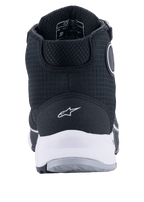 Alpinestars CR-X Drystar® motorschoenen, zwart en wit, achteraanzicht met witte tussenzool en hiel-logo, getextureerd textiel bovenwerk met beschermende hoge constructie, ontworpen voor waterdicht motorrijden en loopcomfort