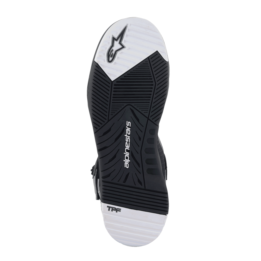 Alpinestars Speedflight Street Schoenen, zoolaanzicht, zwart-witte rubberen buitenzool met dubbele dichtheid en taps toelopend loopvlakpatroon, voorzien van Alpinestars-logo en TPF-branding, urban motorschoenen