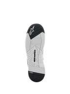 Alpinestars Speedflight-schoenen, motorschoenen, zwart en wit, onderaanzicht van de zool met dual-density rubber, Alpinestars-branding en TPF Transversal Protection Frame-logo, technisch ontworpen profiel voor grip