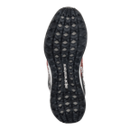 Alpinestars Meta Road V2 schoenen, onderaanzicht van de buitenzool, zwart rubber met een getextureerd hexagonaal loopvlakprofiel voor grip, wit Alpinestars-logo in het midden, rode, zwarte en witte accenten zichtbaar aan de zijkanten
