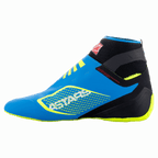 Alpinestars Tech-1 KZ V2 schoenen, kartschoenen, Enamel Blue met zwarte en Yellow Fluo accenten, zijprofielaanzicht met naadloze gebreide bovenconstructie en uit de Formule 1 afgeleide dunne rubberen buitenzool, opvallend ASTARS-logo aan de zijkant.