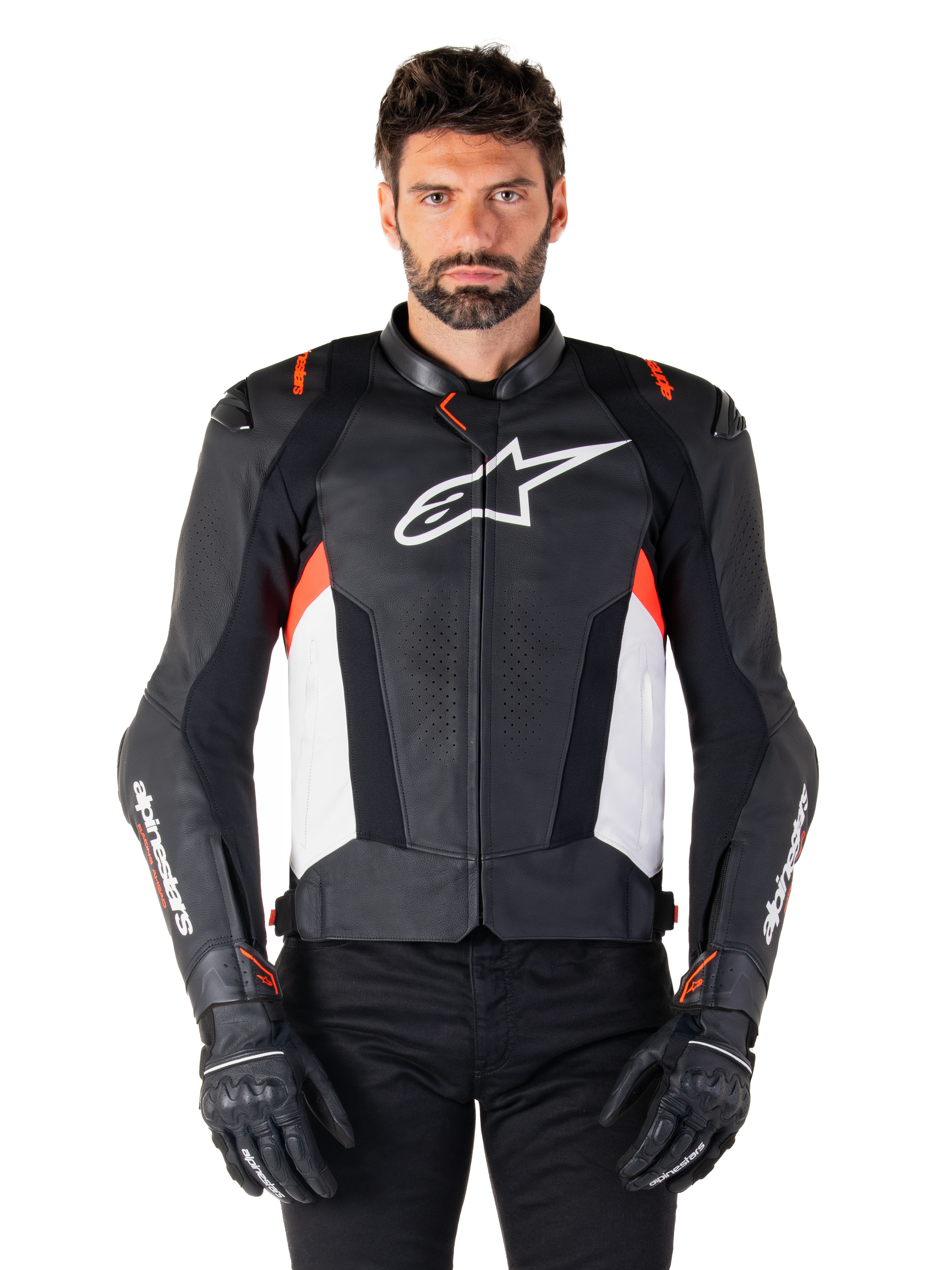 Alpinestars Missile V3 Leather Jacket, Black White and Red Fluo, premium racing sport jacket with bovine leather, featuring white chest logo and Alpinestars branding on sleeves, worn with black motorcycle gloves and pants