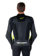 Alpinestars Missile V3 Airflow Leren Jas, achteraanzicht, zwart met fluogeel en witte accenten, uitgebreide geperforeerde leren panelen voor koeling, Alpinestars-branding op de boven- en onderrug, race-geïnspireerde motorjas