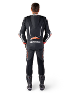 Alpinestars GP-R7 leren pak, zwart en wit, met aerodynamische speedhump en accordeonpanelen voor racing.