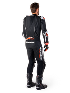 Alpinestars GP-R7 leren pak 1 stuk, heren racepak in zwart en rood fluo met aerodynamische bult en Tech-Air Ready-logo.