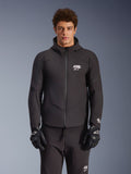 Alpinestars Aeroshell Waterproof Jacket, Black, Motorcycle Urban Jacket, Hooded Design with Full Front Zipper, White Logos on Chest and Sleeves, Worn with Matching Black Pants and Gloves