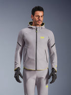 Alpinestars Aeroshell Waterproof Jacket, Mid Gray and Yellow Fluo, hooded motorcycle softshell jacket with black zippers, worn with matching gray pants and black gloves, waterproof performance gear for road riding