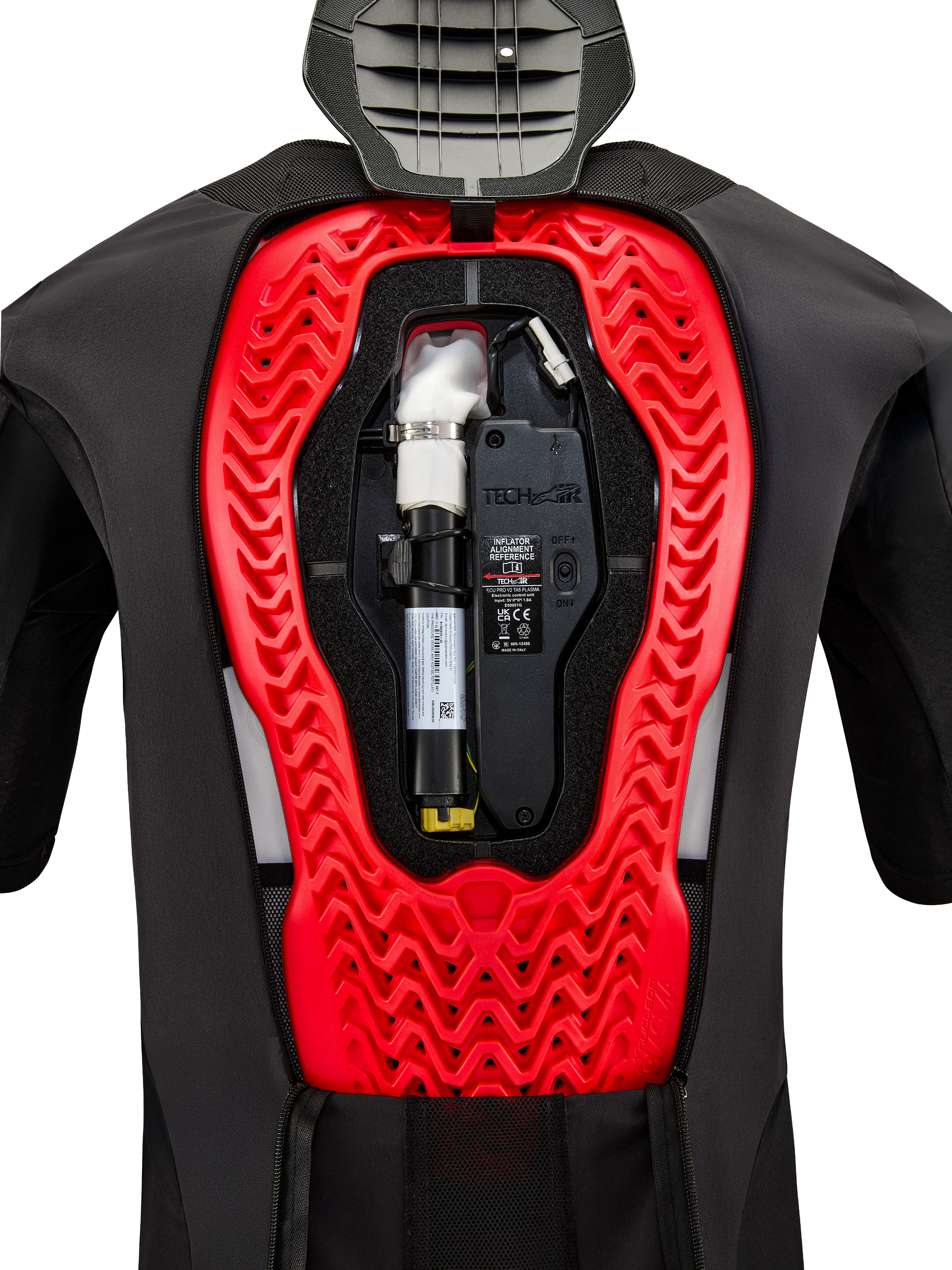Alpinestars Tech-Air 5 Plasma Airbagsysteem, binnenaanzicht met de geïnstalleerde zwarte vervangende canister en elektronische besturingseenheid, geïntegreerd in een felrode Nucleon Plasma rugprotector in een zwart beschermend vest
