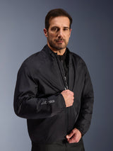 Alpinestars Cusco Drystar® Jacket, Black waterproof membrane layer worn by a male model, featuring Drystar logo on the sleeve, lightweight adventure touring motorcycle gear