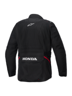 Alpinestars Honda ST-1 Waterproof Jacket, Back View, Black Textile, featuring white Alpinestars star logo on the upper back and Honda branding on the rear cargo pocket, red accents on the sides, durable touring motorcycle jacket