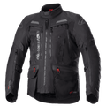 Alpinestars Bogota Pro Drystar motorjas, volledig zwarte motorjas voor touring, grijze en rode accenten, voorzien van grote ventilatiepanelen op de borst, waterdichte zakken met rode treklipjes, hoge beschermende kraag en duurzame textielconstructie voor adventure rijden