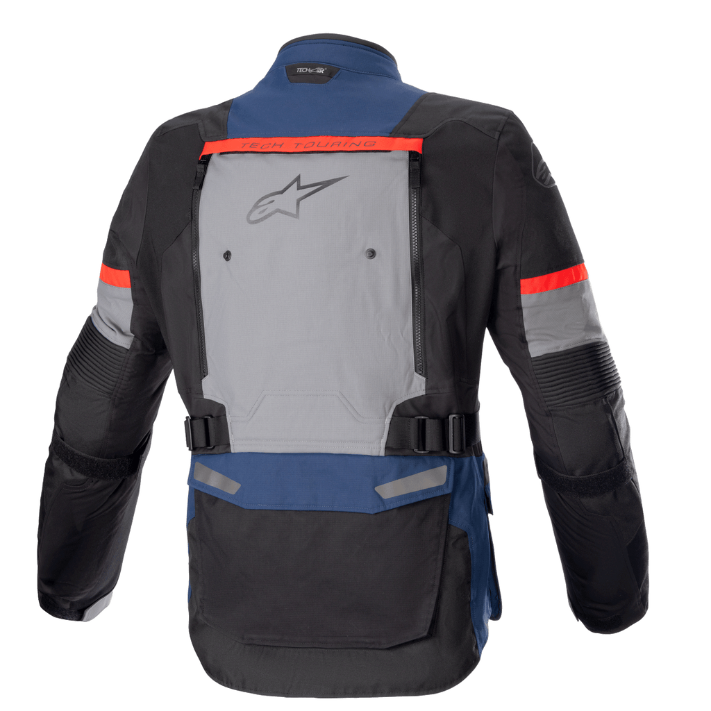 Alpinestars Bogotá Pro Drystar® Jacket, adventure touring motorjas, donkerblauw, zwart en helderrood, achteraanzicht met een groot grijs ventilatiepaneel met Alpinestars-logo, rode 'Tech Touring'-accenten en verstelbare taillebanden