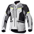 Alpinestars Bogota Pro Drystar motorjas, adventure touring motorjas, ijsgrijs en donkergrijs met zwarte panelen en fluor gele accenten, voorzien van meerdere cargozakken en ventilatieritsen, duurzaam waterdicht textielontwerp voor alle weersomstandigheden