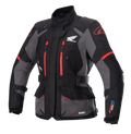 Alpinestars Stella Honda Andes V3 Drystar damesmotorjas, touring motorjas, zwart en grijs met felrode accenten, voorzien van Honda Wing-logo op de borst, rode ritsen, verstelbare taille- en armriemen en duurzame waterdichte constructie