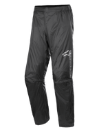 Alpinestars Hurricane Rain V2 Pant, waterdichte motorregenbroek, zwart, met reflecterend logo op het linkerbovenbeen, elastische tailleband, ergonomisch knieontwerp en glanzende windbestendige gelamineerde stof voor road en adventure touring