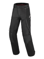 Alpinestars Andes V4 Drystar® Broek - Lang, zwarte adventure-touring motorbroek, voorzien van grote cargozakken, versterkte kniepanelen, ventilatieopeningen met rits op de dijen en een wit Alpinestars-logo op de linkerdij