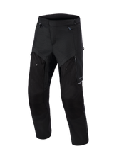 Alpinestars Cusco Drystar® broek, adventure motorbroek, zwart, vooraanzicht, met ritsventilatiepanelen op de dijen, duurzame textiele ripstop-constructie en ergonomisch ontwerp voor weg- en adventure-touring