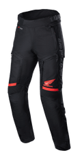 Honda Bogota' Pro Drystar® broek, motortouringbroek, zwart en rood, met rood Honda Wing-logo op het bovenbeen, accordeon stretchpanelen bij de knieën, technische textielconstructie, verstelbare taillebanden en Alpinestars-branding