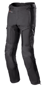 Alpinestars Bogota Pro Drystar 3 Seasons Pants, zwarte touring motorbroek, ventilatieritsen op de dijen, accordeon-stretchpanelen op de knieën, verstelbare taillebanden, duurzame textielstof met Drystar-branding