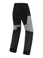 Alpinestars Stella Andes V4 Drystar® broek, dames adventure motorbroek, zwart en donkergrijs, achteraanzicht met grijze panelen op de achterkant van de pijpen, duurzame ripstop-versterkingen op het zitvlak en stretchzones voor bewegingsvrijheid, waterdicht textielontwerp.