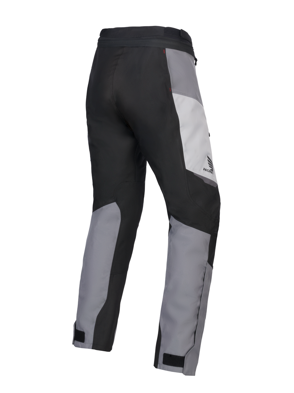 Alpinestars 2025 Honda Stella ST-1 Waterproof damesbroek, motor toerbroek voor dames, Ice Gray, Dark Gray en zwart, driekwart achteraanzicht met duurzame textielconstructie, grijs en zwart kleurgeblokte panelen, Honda-branding op de heup en verstelbare enkelafsluitingen.
