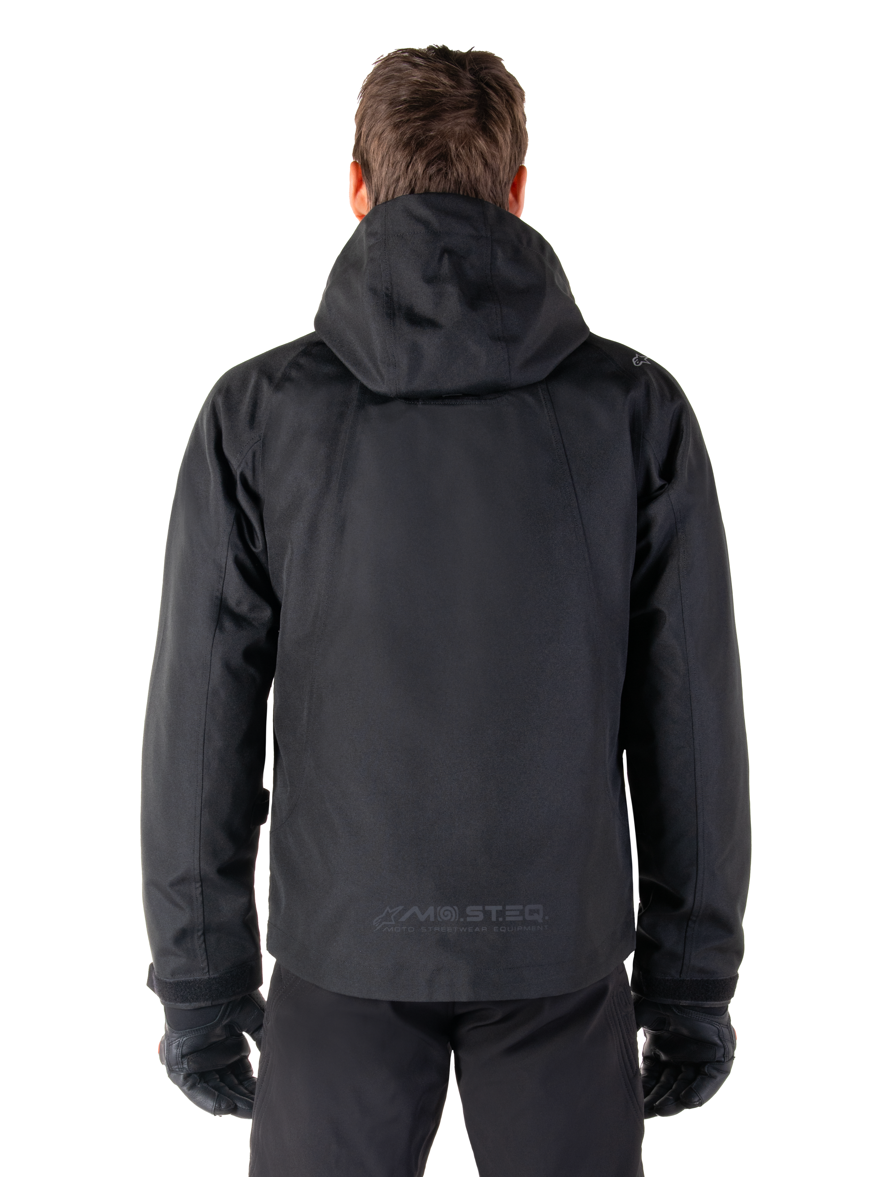 Alpinestars Morush waterdichte parka, zwarte urban herenmotorjas, achteraanzicht met capuchon en reflecterend MO.ST.EQ.-logo.