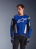 Alpinestars T-GP Air Jacket, Sport Textile Motorcycle Jacket, Bright Blue and Navy with White accents, featuring large star logo on chest, mesh ventilation panels, worn by model with matching gloves and black pants