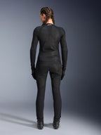 Alpinestars Stella Troop-Air jas, motorjas voor dames, zwart, achteraanzicht van een rijder die een technische mesh jas draagt, gecombineerd met bijpassende zwarte motorbroek, handschoenen en laarzen, nauwsluitend ademend ontwerp met een wit Alpinestars-logo op de kraag