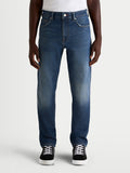 Alpinestars Flex-AST 8 Denim Pants Short, men's urban motorcycle jeans in medium blue, straight-leg fit worn by a model, AA-certified single-layer riding denim with COOLMAX comfort