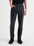 Alpinestars Flex-AST 7 Denim broek, urban motorjeans voor heren in vervaagd zwart, met single-layer A-TRAACX technisch denim en CE-gecertificeerde bescherming, gedragen door een model