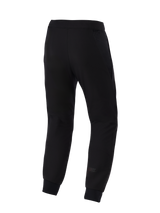 Alpinestars Aeroshell Airflow broek, motorbroek, zwart, achteraanzicht met een lichtgewicht stretch softshell-chassis, geïntegreerde 2D mesh-panelen voor ademend vermogen, lasergeperforeerde kuitzones en een subtiel Astars-logo op het onderbeen.