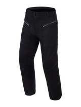 Alpinestars Flex-AST Canvas Pants, stedelijke motorbroek, zwart, met geplooide voorzakken met ritssluiting, ergonomisch voorgevormde knieën, stretch canvas textiel, op werkkleding geïnspireerd ontwerp voor stedelijk rijden
