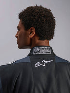 Alpinestars GP Pro Comp V2 FIA heren-autoracepak, zwart en asfalt, FIA 8856-2018 certificering en wit Astar-logo.