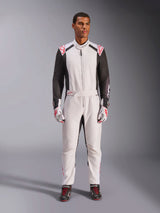 Alpinestars KMX-5 V3 Suit, one-piece karting suit, White Black and Bright Red, worn by a model with matching racing gloves and shoes, professional motorsport gear for competitive go-kart driving.
