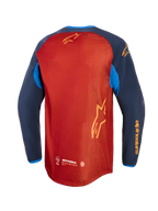 Alpinestars Maxdura Dual Jersey, adventure motorjersey, Rust Brown en Mood Indigo met felblauwe accenten, achteraanzicht met volledig mesh-torso, verlaagde achterzoom en gele Alpinestars-branding op de mouwen en achterkant