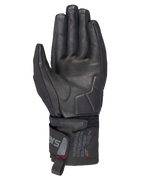 Alpinestars WT-3 Drystar® geïsoleerde handschoenen, zwarte motorhandschoenen, aanzicht van de handpalm met leren versteviging en gewatteerde palm, middellange manchet met Alpinestars Exploration Equipment-branding, touchscreen-compatibele vingertoppen, duurzame touring-bescherming voor alle weersomstandigheden.