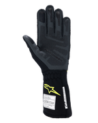 Alpinestars Tech-1 ZX V4 handschoenen, autoracehandschoenen, Tar Gray en zwart met fluogeel logo, handpalmaanzicht met getextureerde 3D siliconen grip en FIA/SFI-veiligheidscertificeringslabels, professionele autosportuitrusting