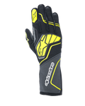 Alpinestars Tech-1 ZX V4 handschoenen, autoracehandschoenen, Tar Gray, zwart en fluogeel, met een groot geel sterlogo op de handrug en witte branding op de manchet, honingraatstof met hoekige neonaccenten, professionele motorsportuitrusting