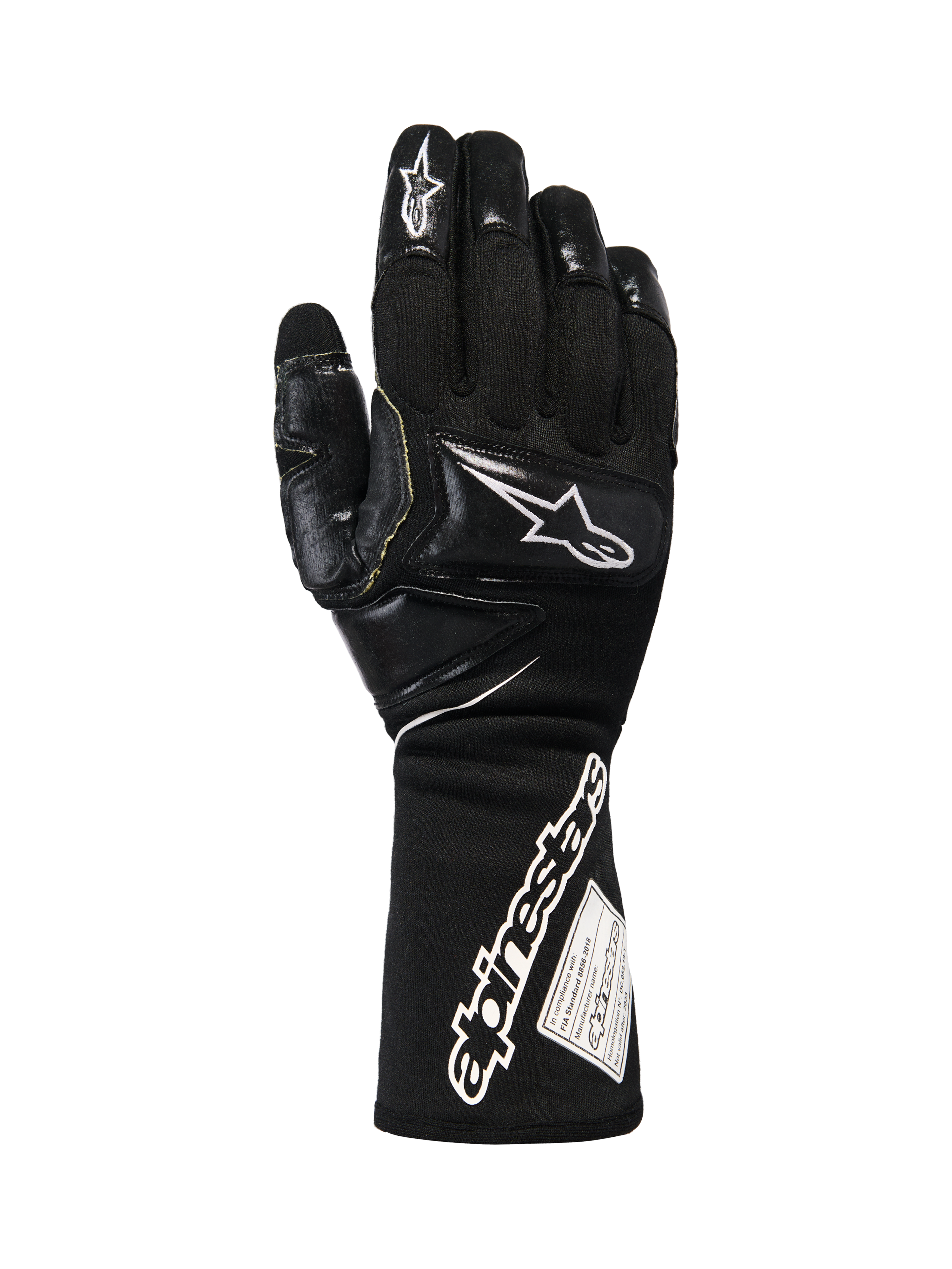 Alpinestars Tech-M V2 FIA-handschoenen, zwart-witte pitcrew-racehandschoenen, verlengde manchet met opvallend Alpinestars-logo en FIA-label, versterkte patches op knokkels en vingers voor impactbescherming, professionele motorsportuitrusting