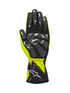 Alpinestars Tech-1 K Race V2 Graphic 1 handschoenen, geel fluo, zwart en wit, zicht op de handpalm voorzien van zwart synthetisch suède met een wit siliconen stippenpatroon voor grip, elastische manchet met wit Alpinestars-logo, hoogwaardige karthandschoen