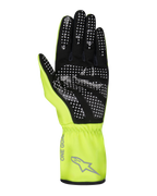 Alpinestars Tech-1 K Race V2 Pure Gloves, Karting Gloves, Yellow Fluo and Black, palm view showing white dotted silicone grip pattern, gray Alpinestars logo and 'ONE GOAL' text on the gauntlet cuff, professional motorsport gear