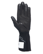 Alpinestars Tech-1 KX V4 handschoenen, karthandschoenen, zwart, zicht op de handpalm met 3D siliconen grippatroon, externe naden en geribbelde manchet met grijs Astars-logo, professionele motorsport race-uitrusting
