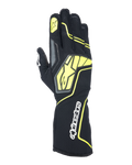 Alpinestars Tech-1 KX V4 handschoenen, kartinghandschoenen, Tar Gray, zwart en fluogeel, bovenaanzicht met ademende mesh-constructie, groot geel Alpinestars-logo, wit woordmerk op de pols, gele ster op de wijsvinger, modern sportief design
