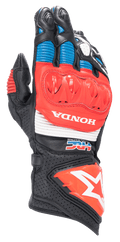 Alpinestars Honda GP Pro R3 motorhandschoenen, racing motorhandschoenen, zwart met felrode en blauwe accenten, voorzien van een rode DFS harde knokkelbeschermer, witte HONDA- en HRC-logo's, geperforeerd leer met accordeonpanelen en het Alpinestars sterlogo op de manchet