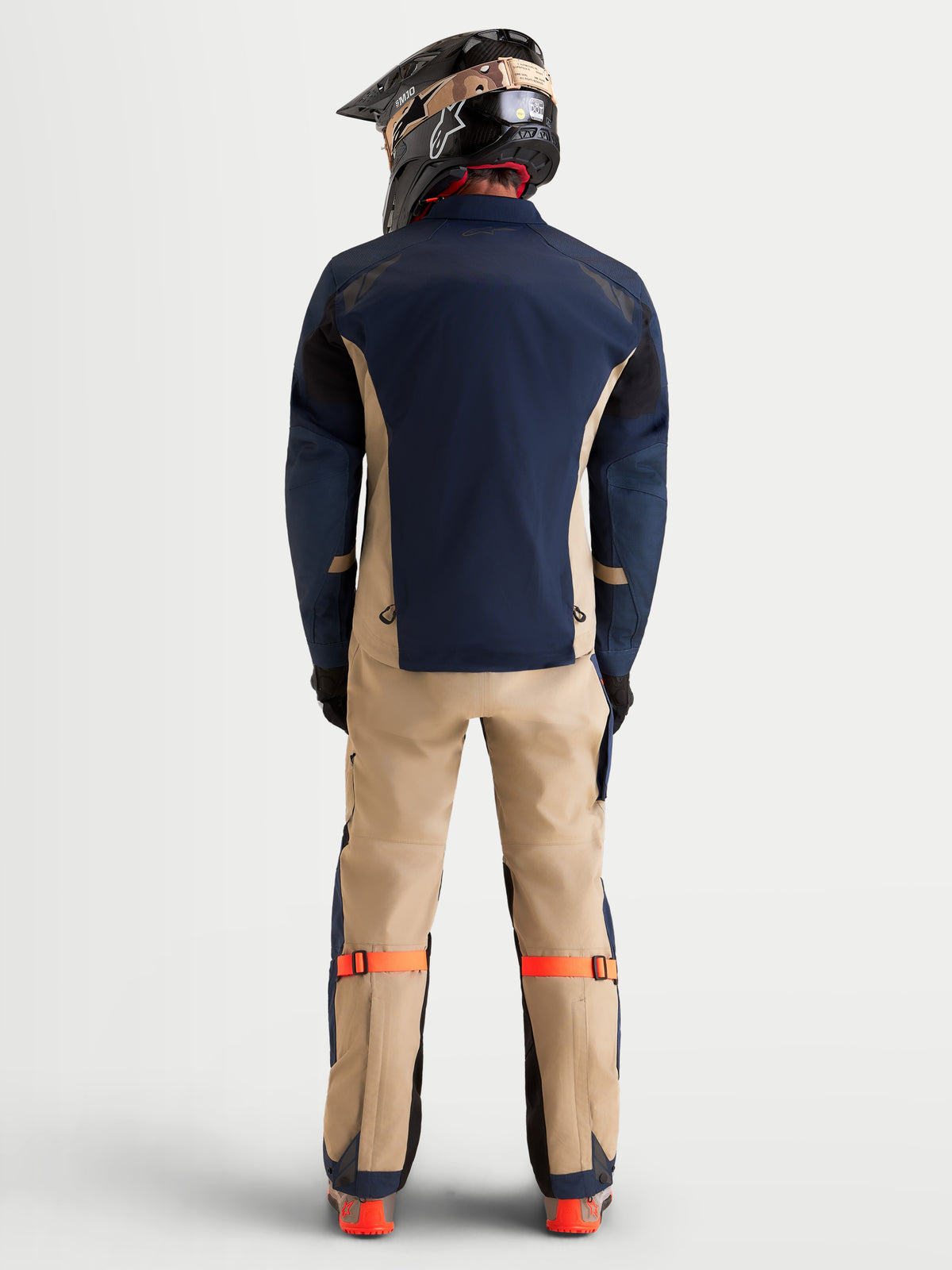 Alpinestars Arenis Gore-Tex® Jacket, men's adventure touring motorcycle jacket in night navy and mood indigo, rear view showing waterproof textile construction and helmet-compatible riding gear context.