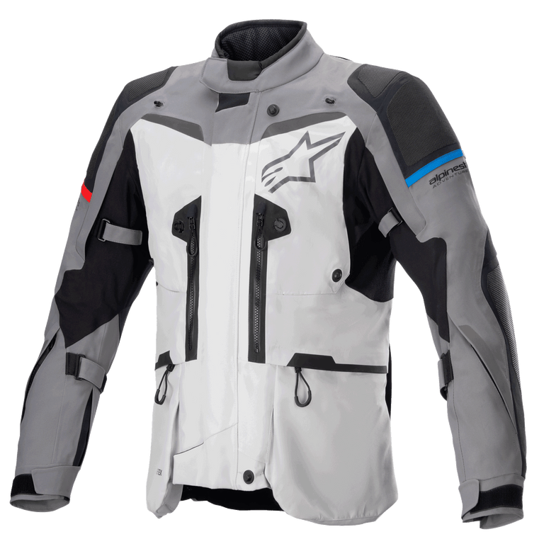 Alpinestars Boulder GORE-TEX Jacket, adventure touring motorcycle jacket, Dark Gray and Ice Gray, featuring multiple ventilation zippers, reinforced shoulder and elbow panels with blue and red accents, large Alpinestars logo on the chest, high-performance waterproof technical gear