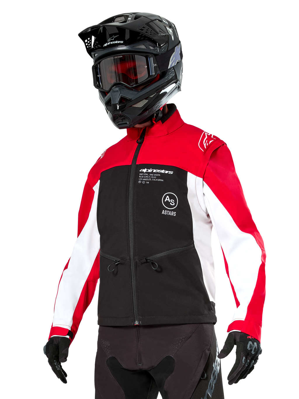 Alpinestars Lite-Dura Softshell Jacket, motorjas, zwart, felrood en wit, gedragen door een rijder met een zwarte motorcrosshelm, rode bril en handschoenen, opvallende branding op de borst, ontworpen voor off-road en enduro rijden