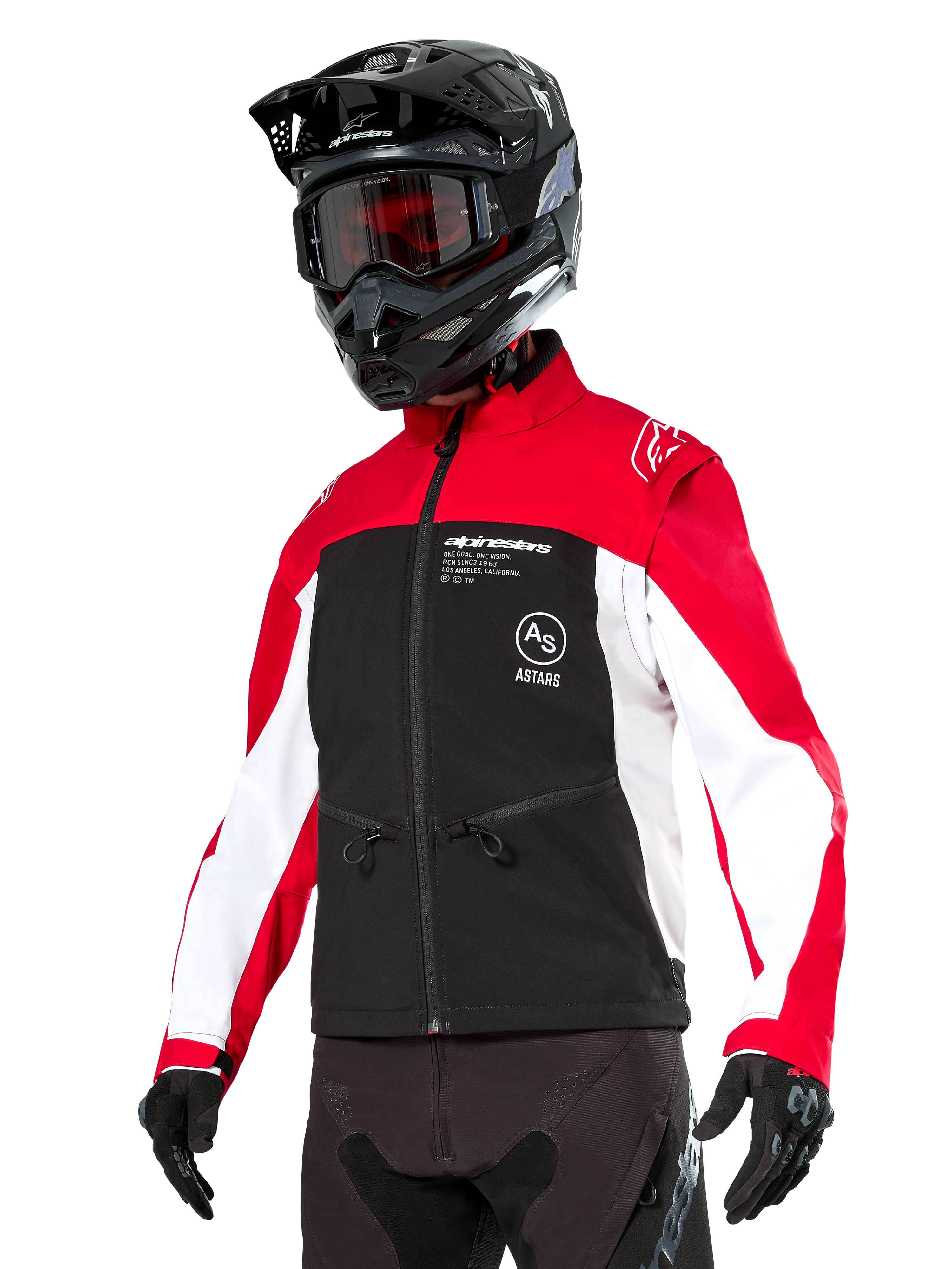 Alpinestars Lite-Dura Softshell Jacket, motorjas, zwart, felrood en wit, gedragen door een rijder met een zwarte motorcrosshelm, rode bril en handschoenen, opvallende branding op de borst, ontworpen voor off-road en enduro rijden
