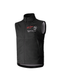 Alpinestars Youth Techstar Softshell Vest, zwart, mouwloos motorcrossvest met rood sterlogo, hoge kraag, ritssluiting aan de voorzijde, "ONE GOAL. ONE VISION." branding, lichtgrijze binnenvoering, jeugd motorsportkleding